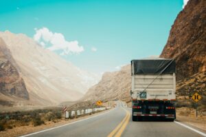 CDL truck driver on the open road — signs you're ready to become an owner operator